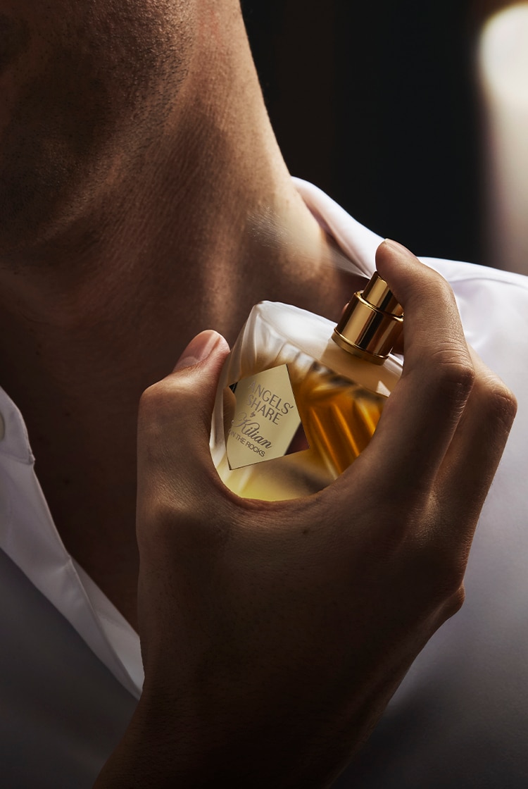 Man spraying perfume